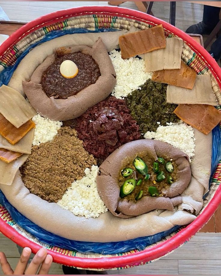 Traditional mesob basket with Ethiopian food